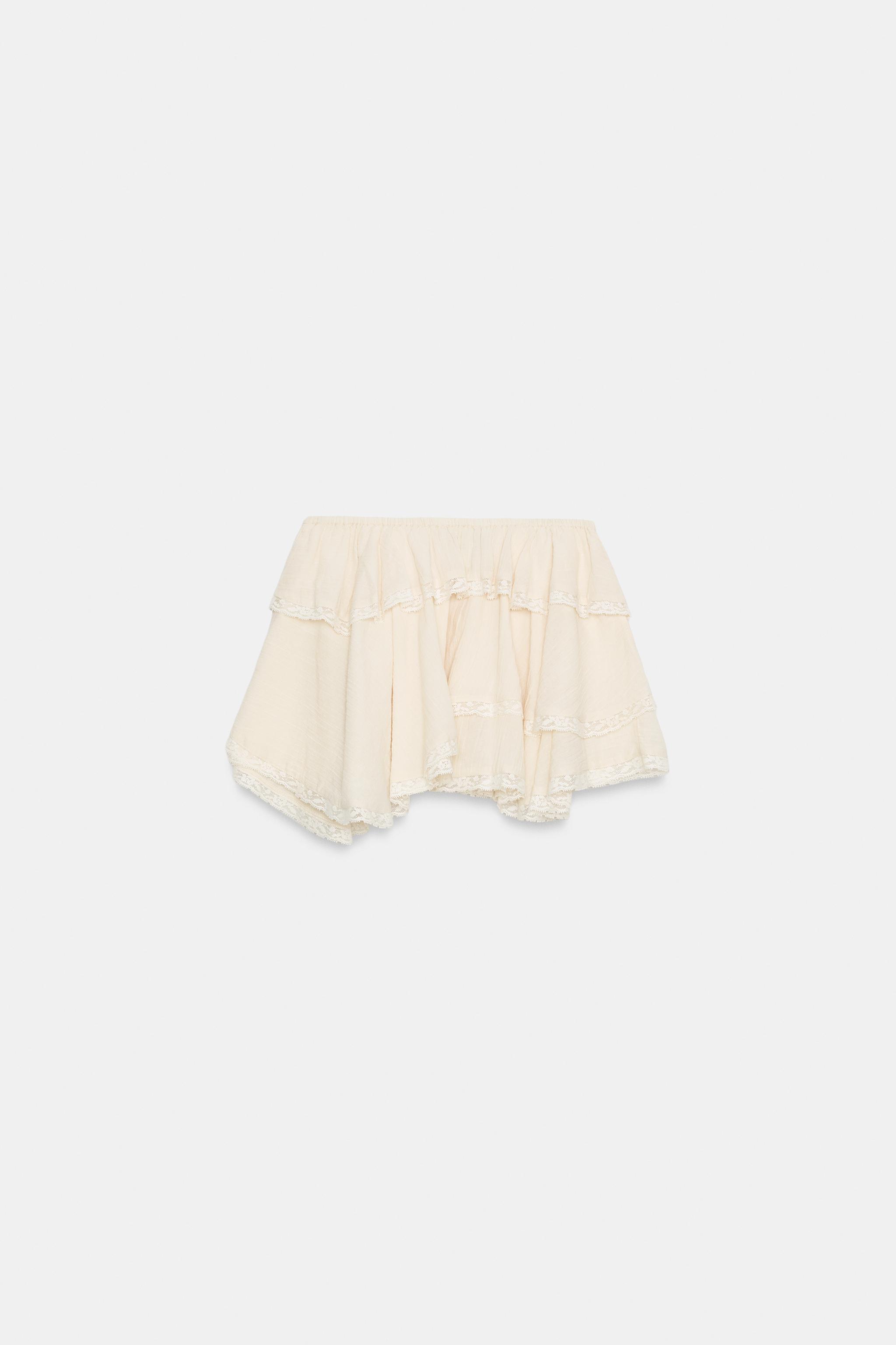 MINI JUPE VOLANTS DENTELLE